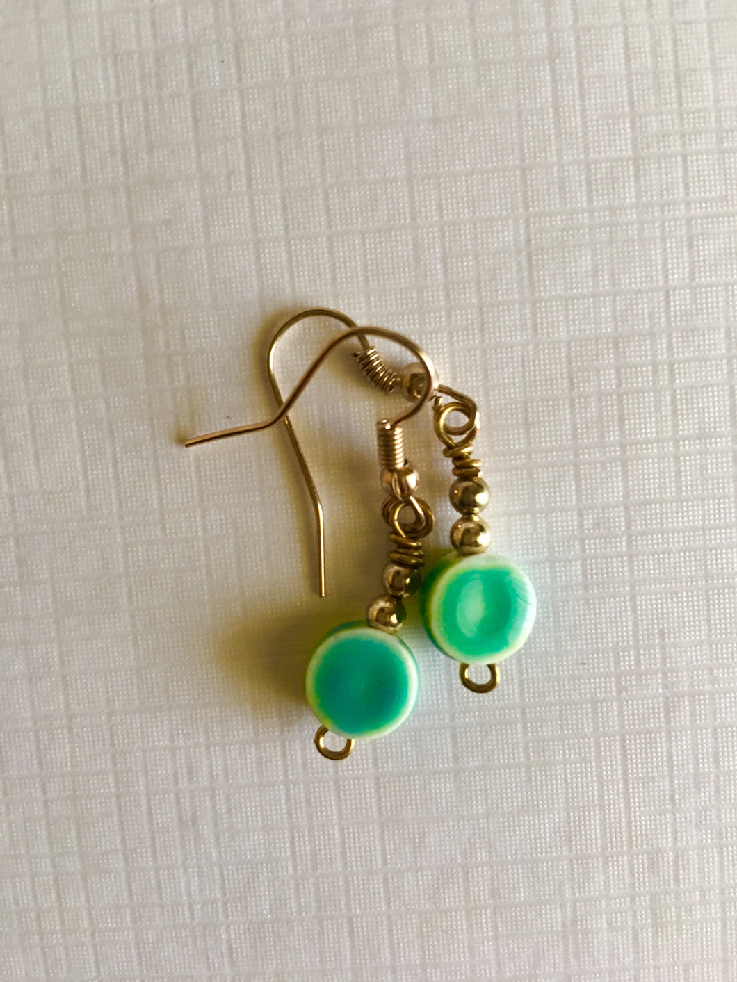 A Green glass bead